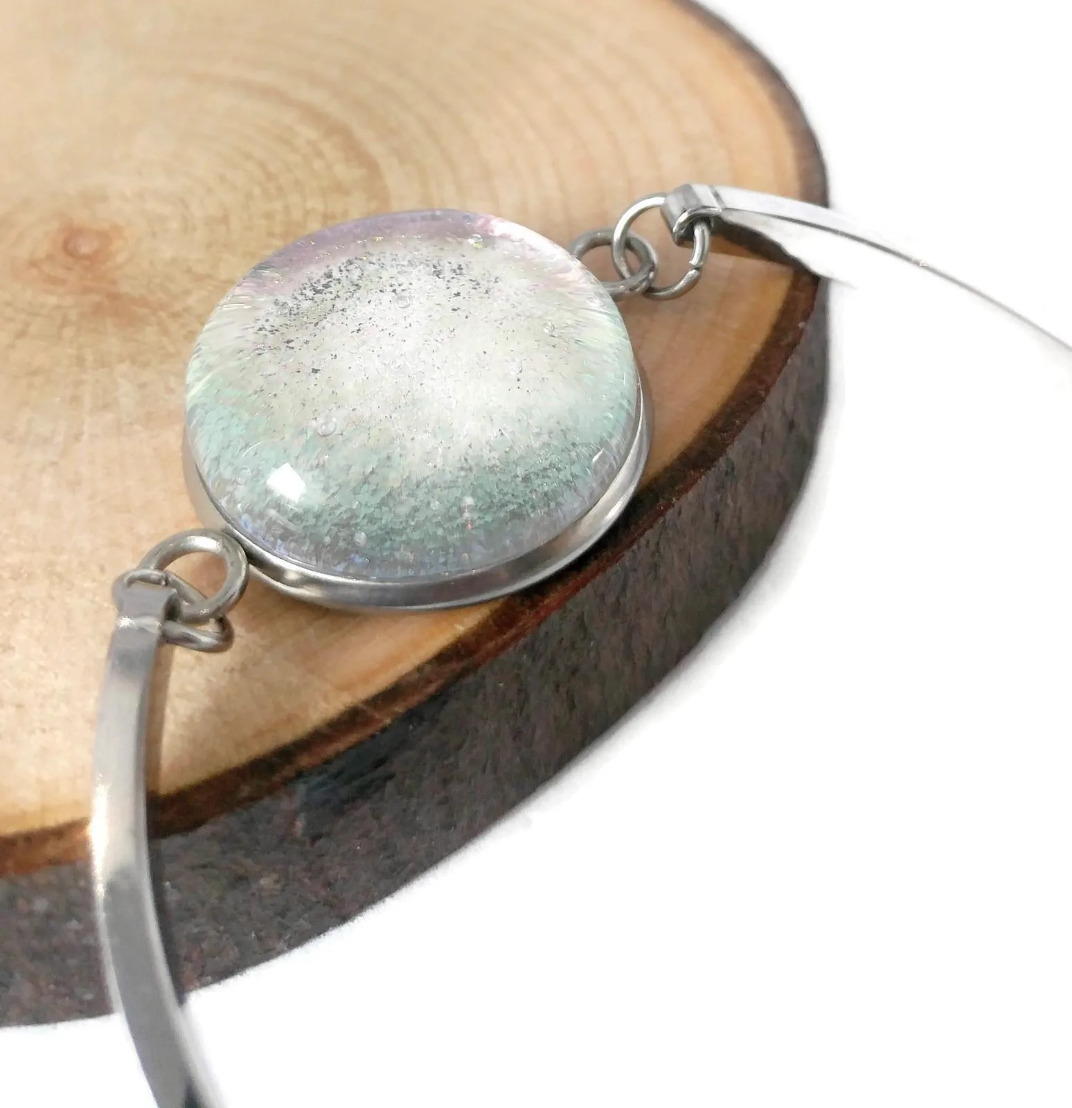 Bracelet d'acier inoxydable et verre fusion transparent rose pâle